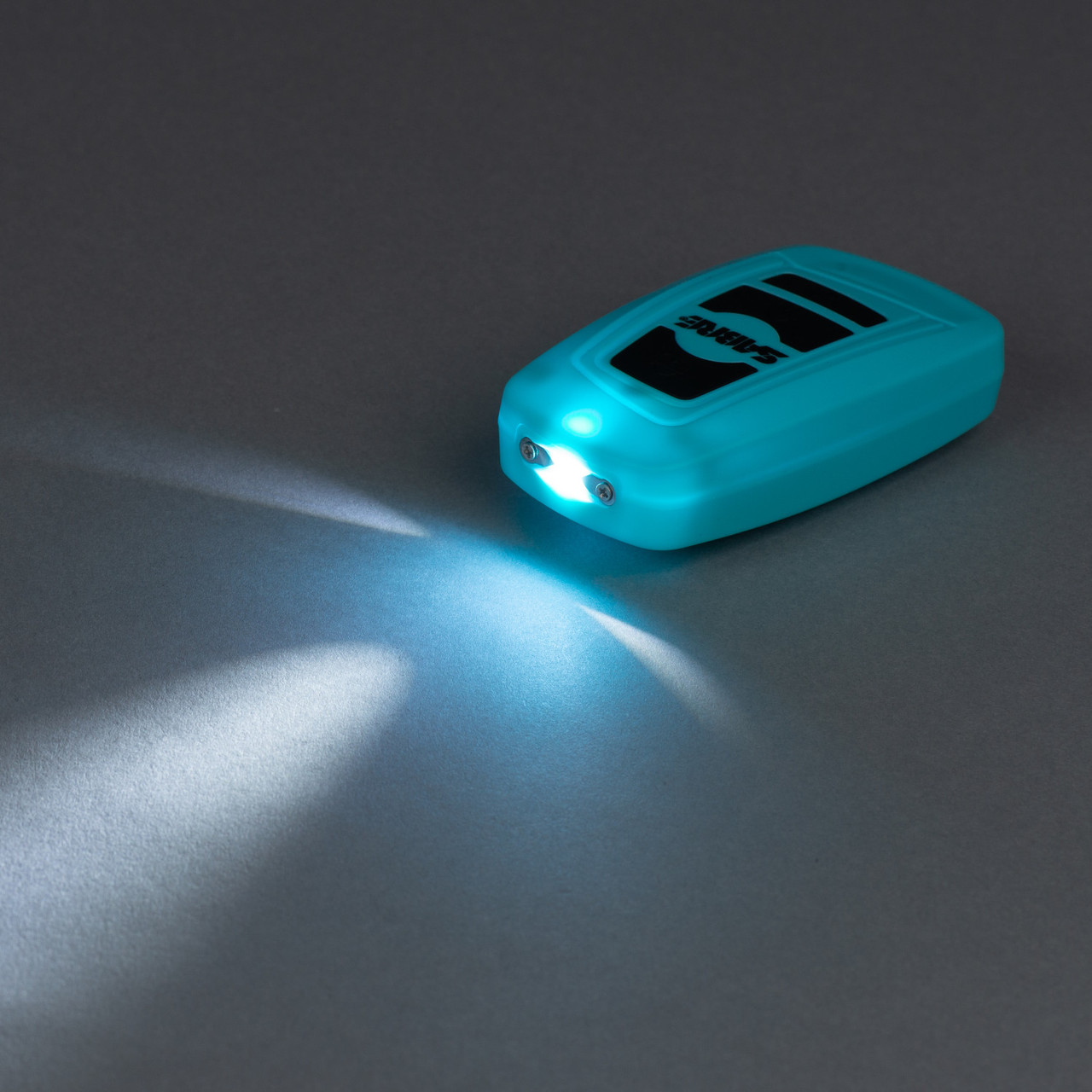 Zapewnij sobie bezpieczeństwo z paralizatorem SABRE 3-w-1: głośny alarm, silny paralizator i praktyczna latarka w stylowym, małym opakowaniu. - LifeGun.pl Paralizator Sabre 3w1 G S 1013 Turkusowy 5