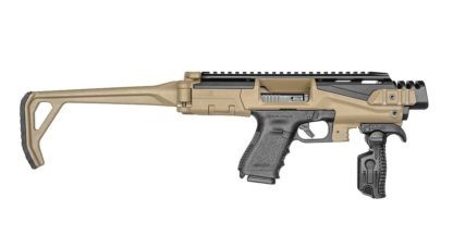 Konwersja Glock KPOS Scout FAB Zestaw Basic Tan Konwersja Scout to połączenie mocnego aluminium lotniczego i lekkiego polimeru. Po umieszczeniu w nim pistoletu zmienia się w imponujący sprzęt taktyczny, do którego można przymocować rozmaite akcesoria - oświetlenie taktyczna, laser i inne. Kompatybilna z Glockami 17, 19, 22, 23, 25, 31, 32 / Gen 3 - - LifeGun.pl Konwersja Glock KPOS Scout FAB Zestaw Basic Tan-1