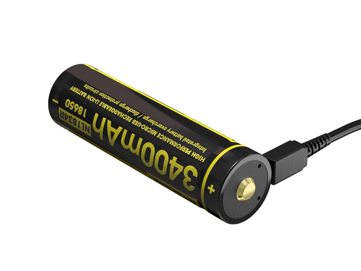 Akumulator Nitecore 18650 Micro USB NL1834R 3400mAh Akumulator o pojemności 3400 mAh z innowacyjną opcją ładowania przez port USB. Wystarczy podłączyć akumulator do kabla micro USB za pomocą wbudowanego portu. Wbudowane 2 diody LED (zielona i czerwona) informują użytkownika o poziomie naładowania akumulatora. Zapewnia ponad 500 cykli ładowania. Akumulator zastępuje dwie baterie CR123, ale - LifeGun.pl Akumulator Nitecore 18650 Micro USB NL1834R 3400mAh-3