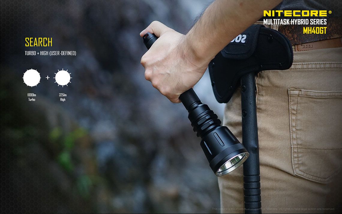 Światło S.O.S.: Tak | Maksymalny czas pracy (godz.): 130 | Zasięg wiązki światła (m): 803 | Waga bez baterii (g): 302 | Ładowarka w zestawie: Tak | Baterie w zestawie: Tak | Futerał: Tak | Wodoodporność: Tak | Kolor: Czarny | Baterie (kompatybilne): 2x 18650 lub 4x CR123 | Światło stroboskopowe: tak | Moc światła (L): 1000 | Średnica głowicy (mm): 60 | Źródło światła: Dioda LED CREE XP-L HI V3 - LifeGun.pl Latarka LED Nitecore MH40GT 1000 Lumenów-14