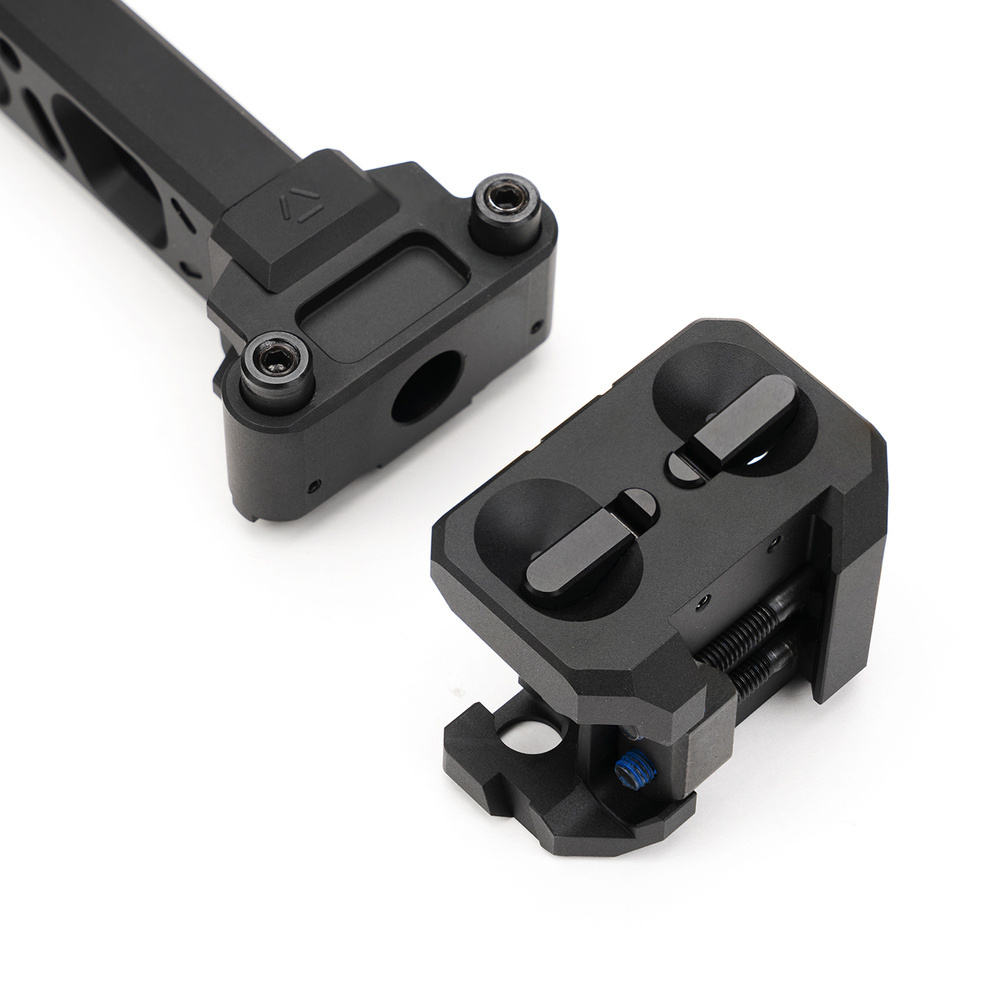 Ta innowacyjna kolba składana z mechanizmem składania na obie strony, kompatybilna z szynami Picatinny, zapewnia wygodę, stabilność i funkcjonalność. - LifeGun.pl Strike Industries Kolba skladana Strike Dual Folder Stabilizer QD Sling Czarna SI FSA DUAL STAB Huglu Mohac 1