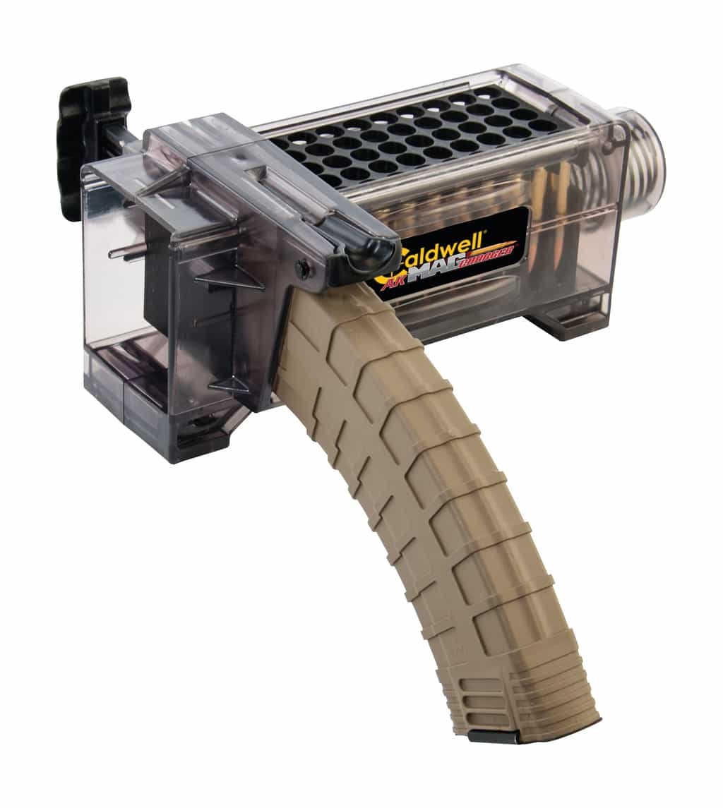 Szybkoładowacz do magazynków AK Caldwell 397599 Szybkoładowacz do magazynków AK Caldwell rewolucjonizuje sposób, w jaki amunicja jest ładowana do magazynków. Cały proces obsługi jest bardzo prosty: do specjalnie wyprofilowanego pudełka z boku szybkoładowacza włóż 50 sztuk amunicji. Dzięki unikatowemu projektowi, możesz zrobić to zbiorczo z fabrycznego opakowania. Amunicja automatycznie układa się we właściwej pozycji. Po - LifeGun.pl Szybkoładowacz do magazynków AK Caldwell 397599-4