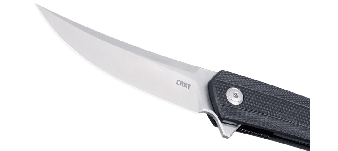 Nóż CRKT 7060 Persian Black Zaprojektowany przez knifemakera Richarda Rogersa CRKT 7060 Persian, to składany nóż wyposażony w głownię o profilu Drop Point, wykonaną ze stali narzędziowej D2, charakteryzującej się dużą odpornością na ścieranie.System łożysk kulkowych IKBS umożliwia płynne rozłożenie klingi jedną ręką przy wykorzystaniu flippera, pełniącego równocześnie funkcję jelca, zapobiegającego osunięciu się dłoni na ostrze w trakcie pracy.Blokada Liner Lock uniemożliwia przypadkowe złożenie się - LifeGun.pl Nóż CRKT 7060 Persian Black-4